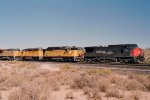 Southern Pacific AC44CW #254 is stopped next to two other sets of power 